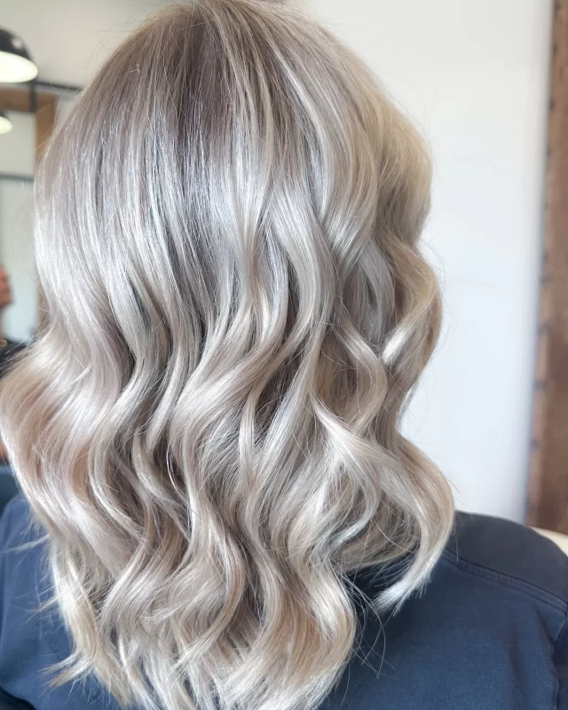 Raquel wanted a softer grow-out with less maintenance, so we created a lived-in blonde by adding depth and a seamless root melt into a cool blonde. Effortless, low-maintenance, and stunning! ✨ Hair by Chantelle @MondooHair #LivedInBlonde #SeamlessBlend #MondooHair #Miamigoldcoast #Blonde
